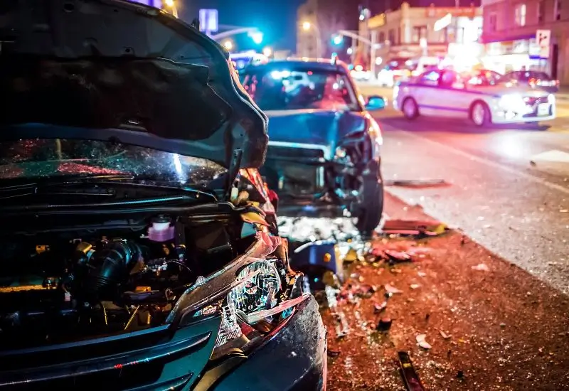 Accident caused by speeding cars with cop on the side